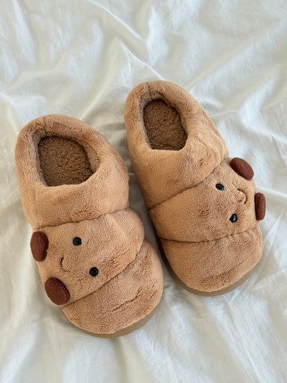Croissant slippers worn