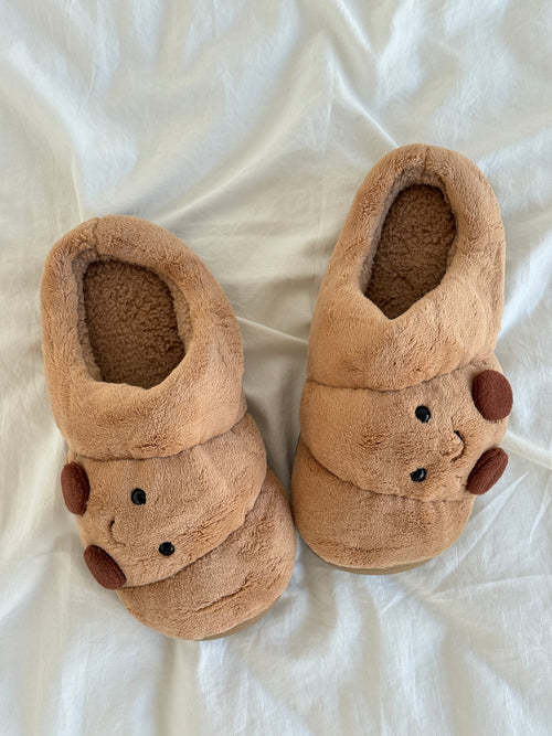 Croissant fuzzy scuff slippers pair